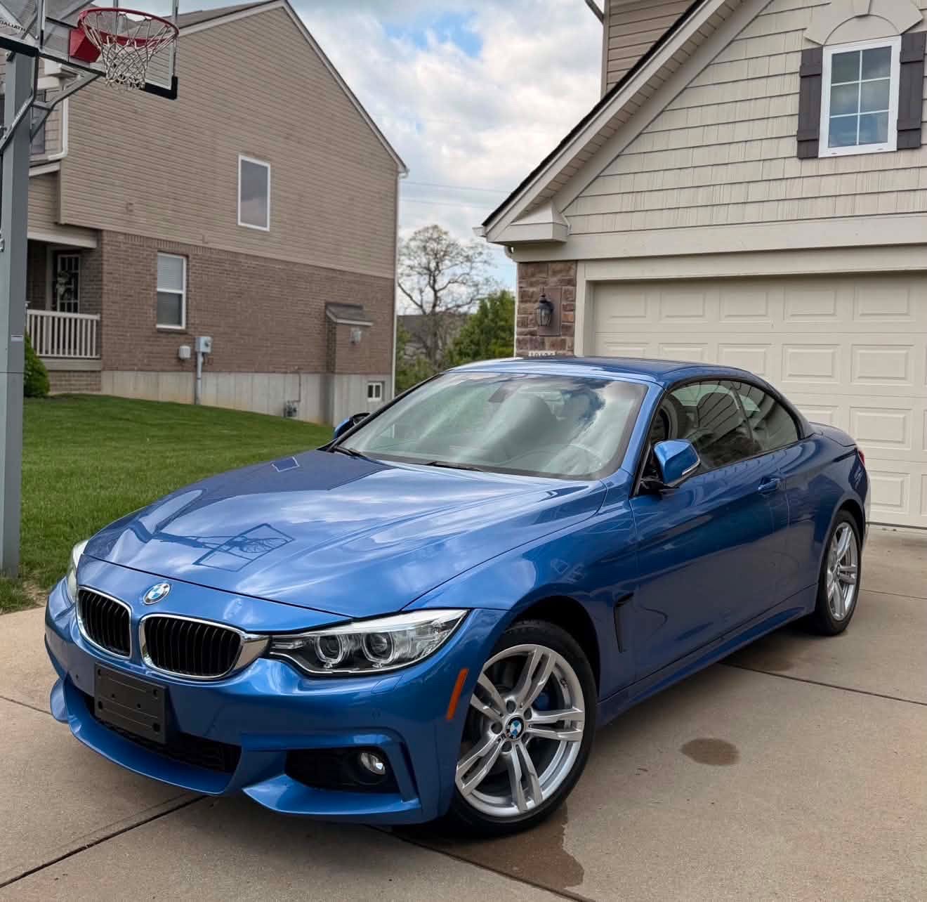 Blue BMW 4-series convertible detailed