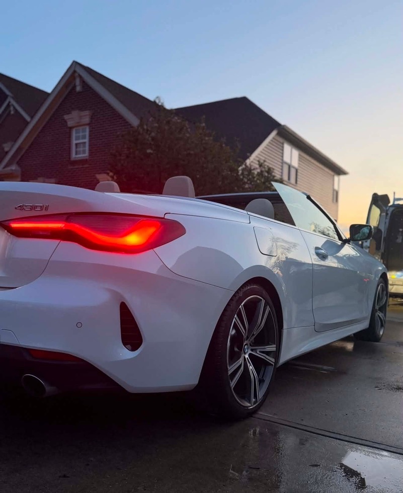 BMW 430i at golden hour after detail